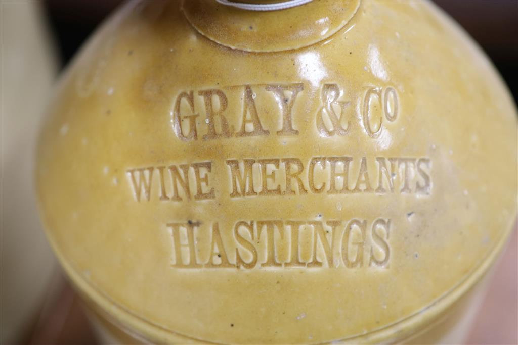 Hastings and St Leonards; a large stoneware pharmacy container and a smaller jar.